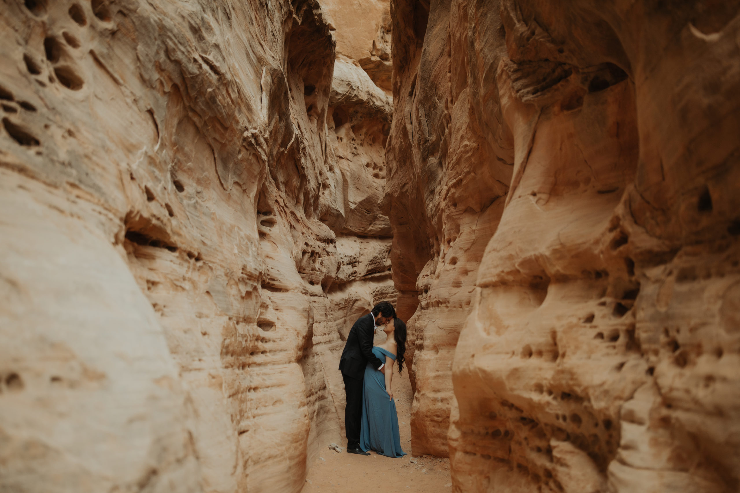 Couple looking around in a canyon