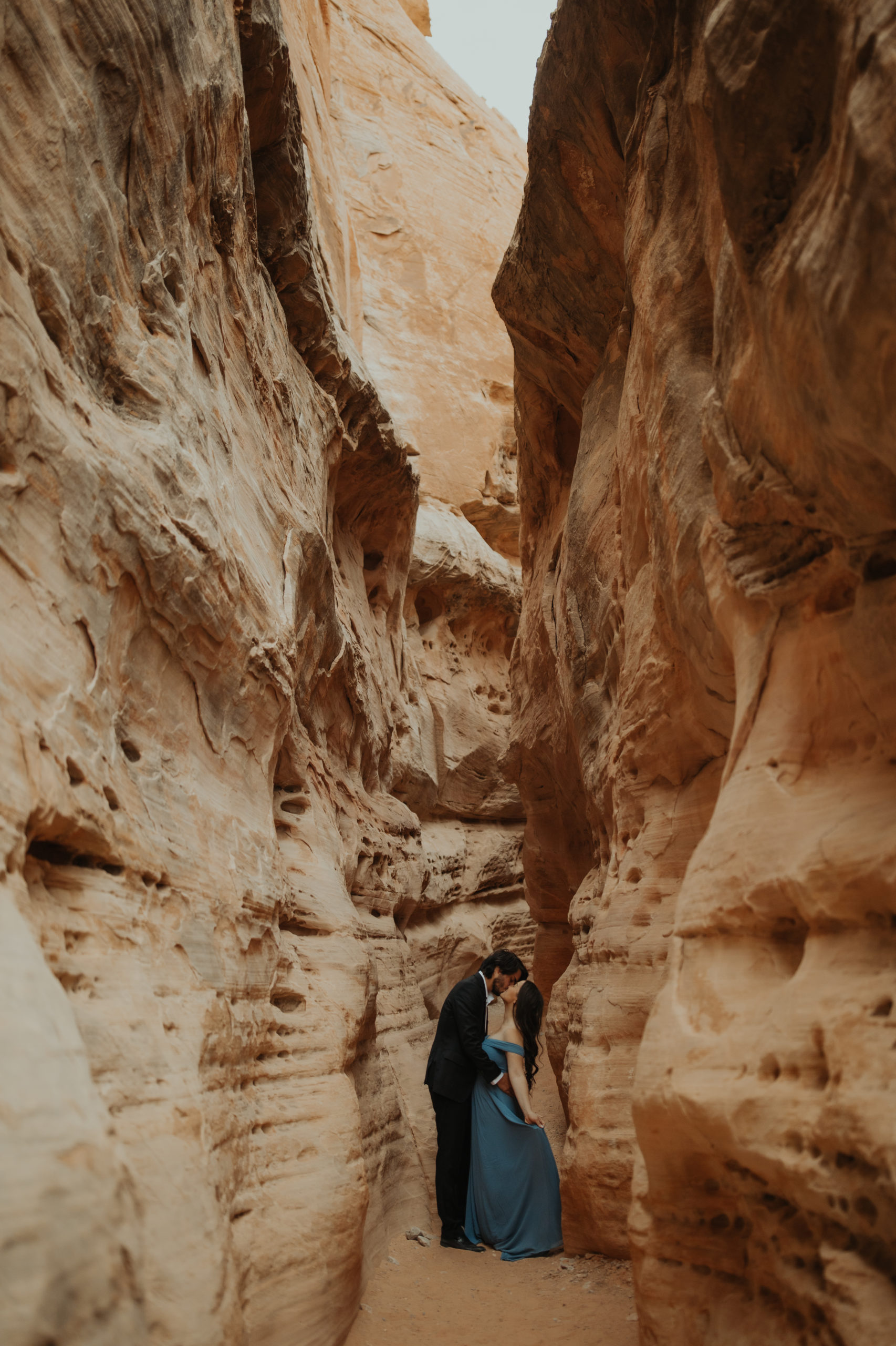 Couple looking around in a canyon