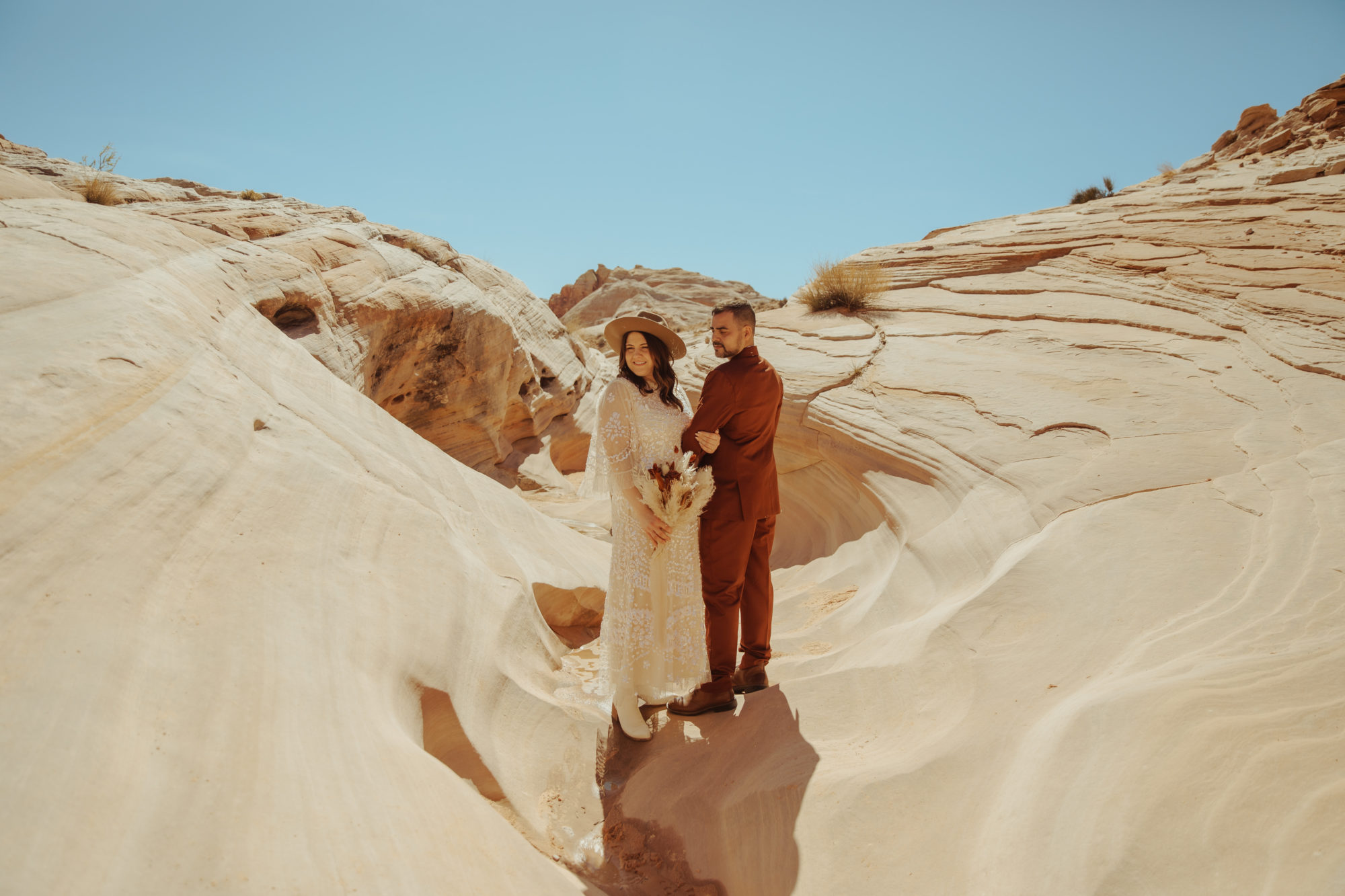 Couple posing for elopement photos in The Valley of Fire