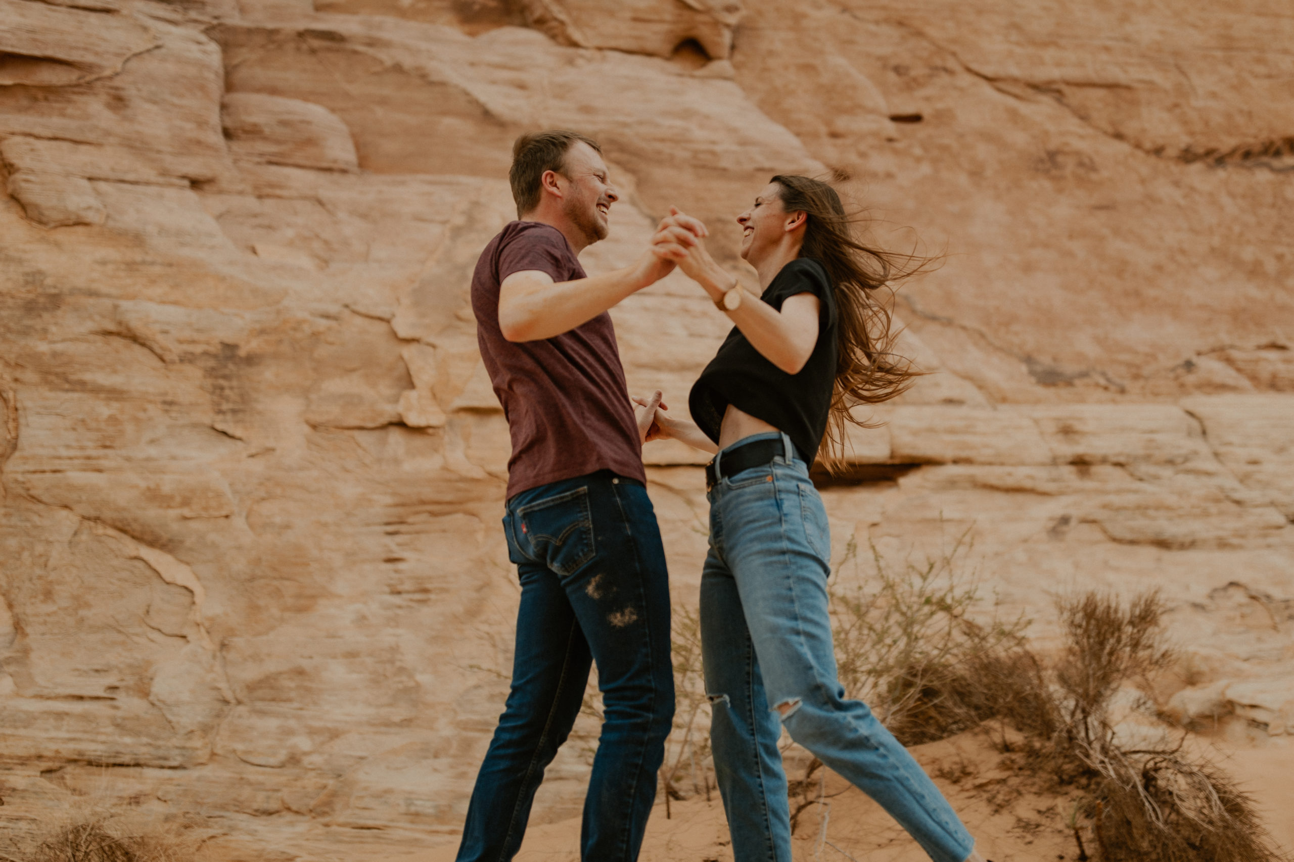 Cute couple being playful together in the desert