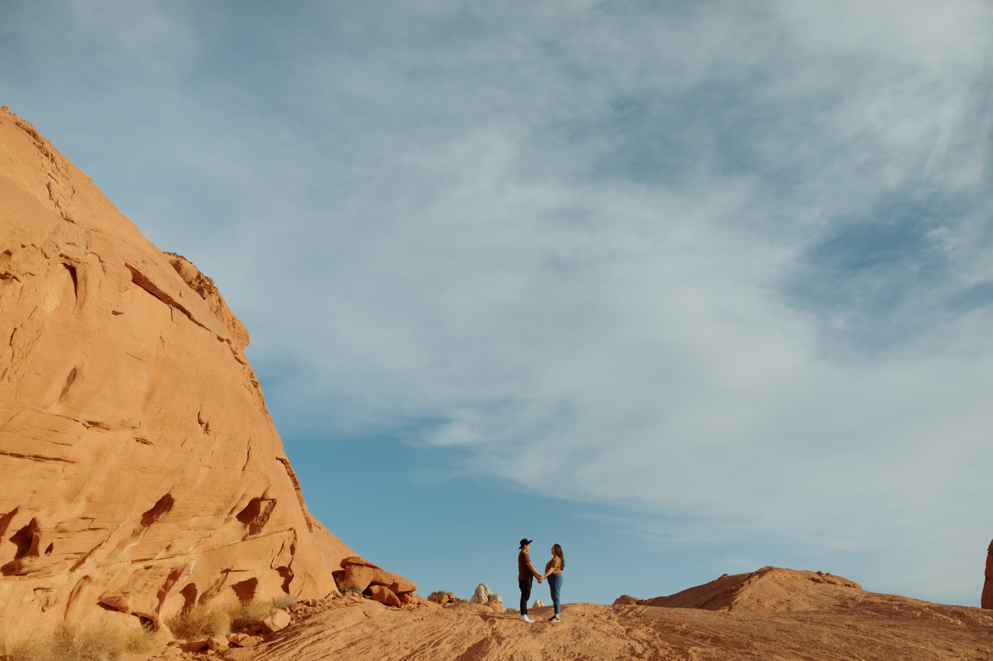 Cute couples walking through valley of fire holding hands