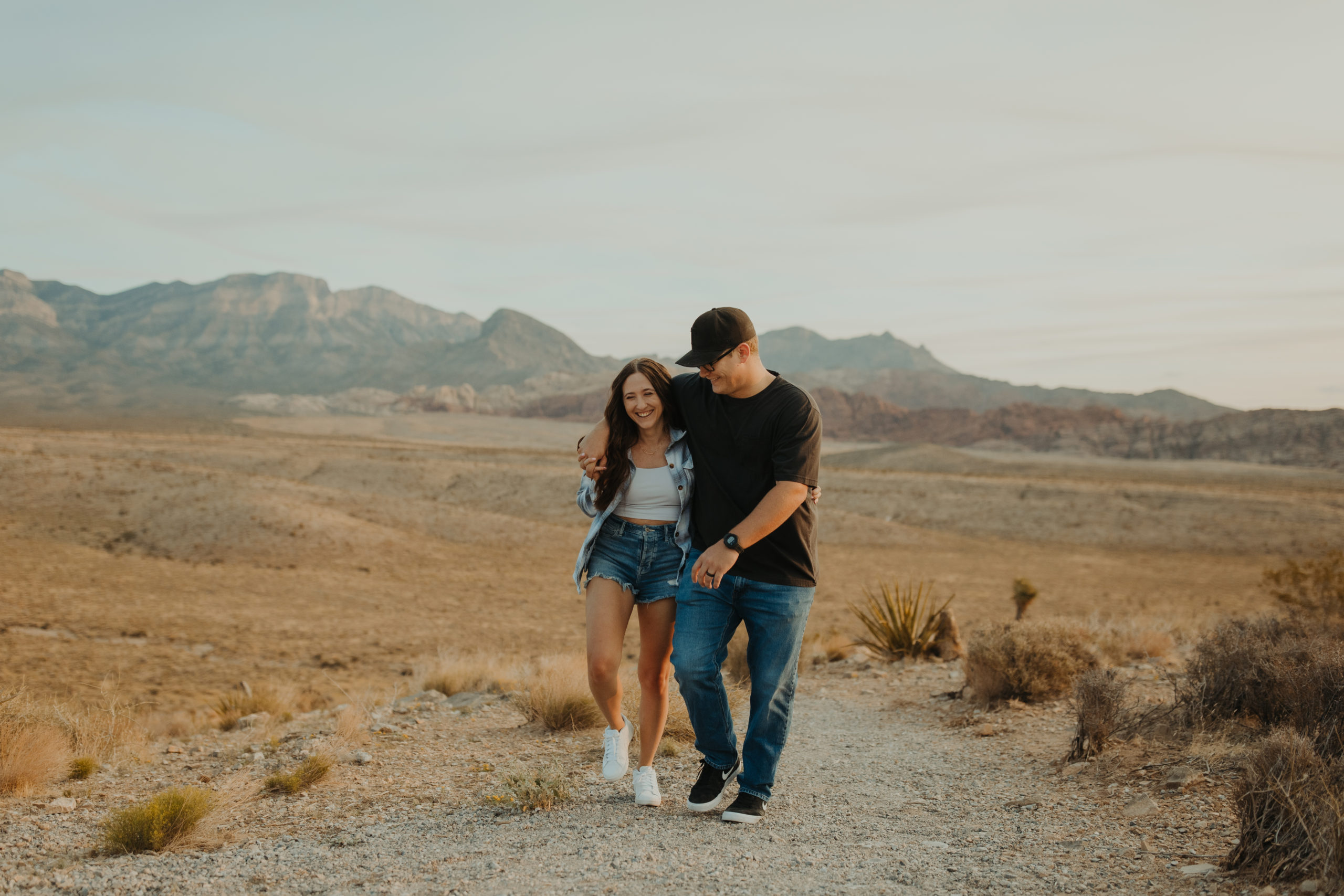 couple walking around the desert