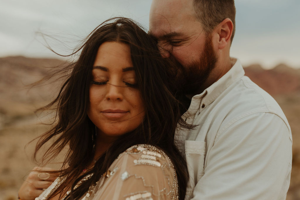 Close-up Portrait of Husband and Wife having an intimate moment while in the desert in Las Vegas during their vow renewal