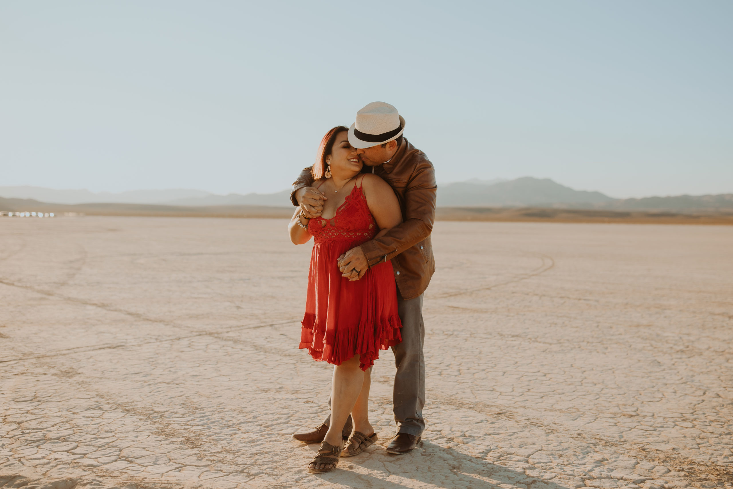 Couple posing in Jean Dry Lake Bed as a unique places to elope
