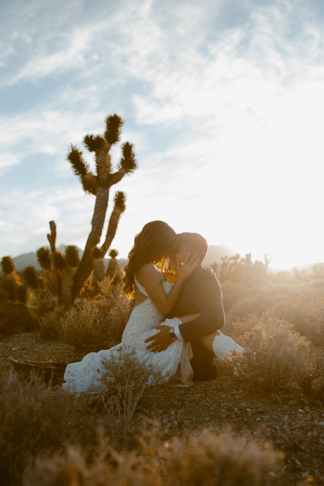 Couple posing during adventure photo session in the desert 