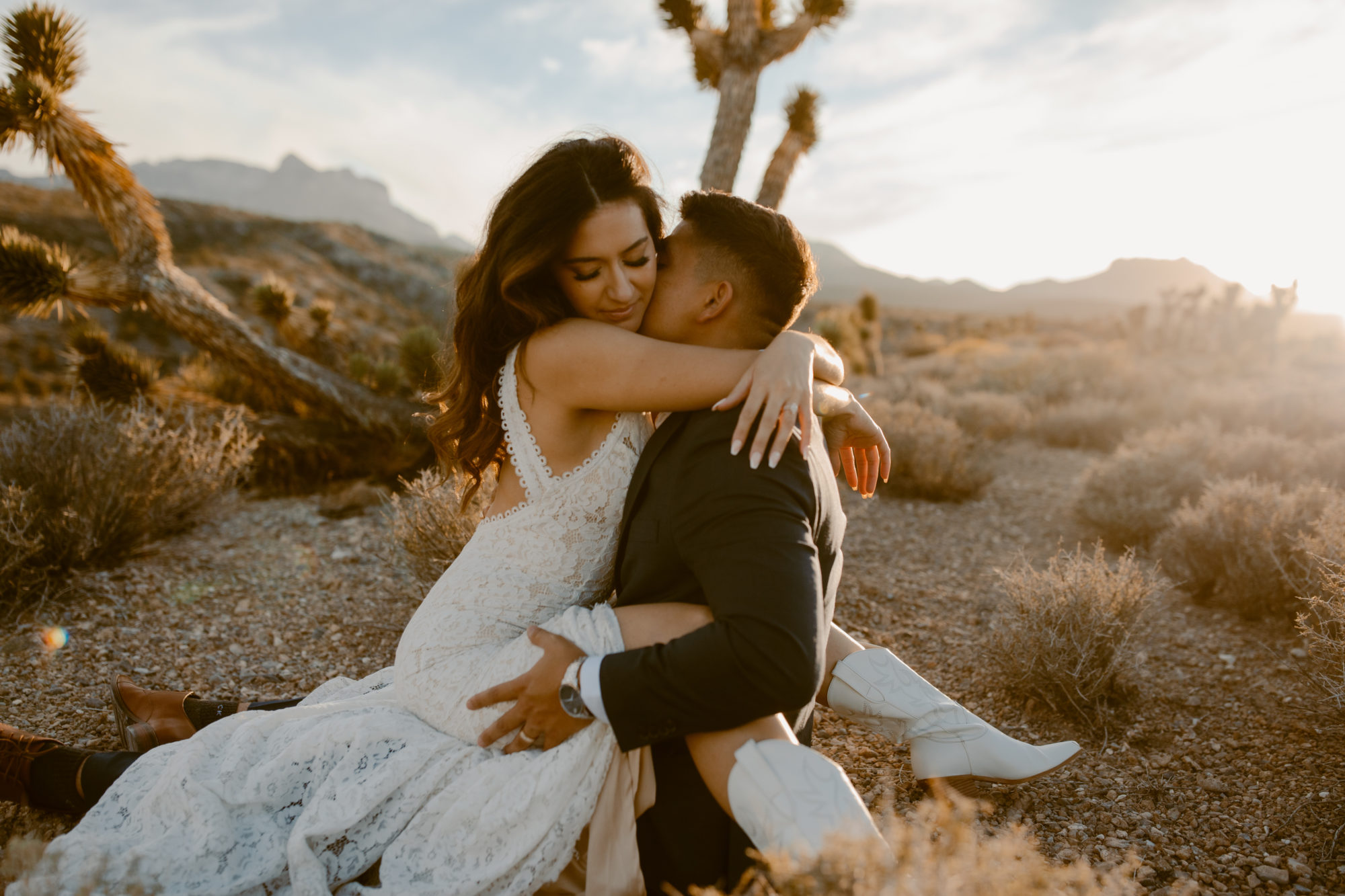 Couple posing during adventure photo session in the desert 