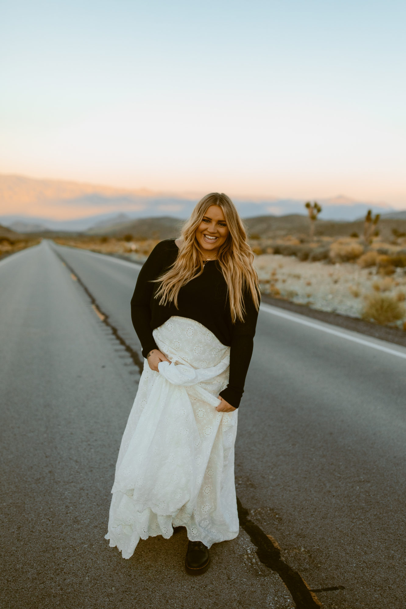 Woman smiling for desert photoshoot