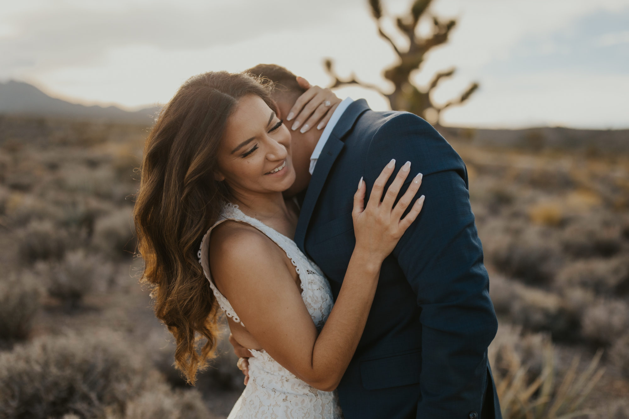 Couple taking elopement photos in the Mojave desert