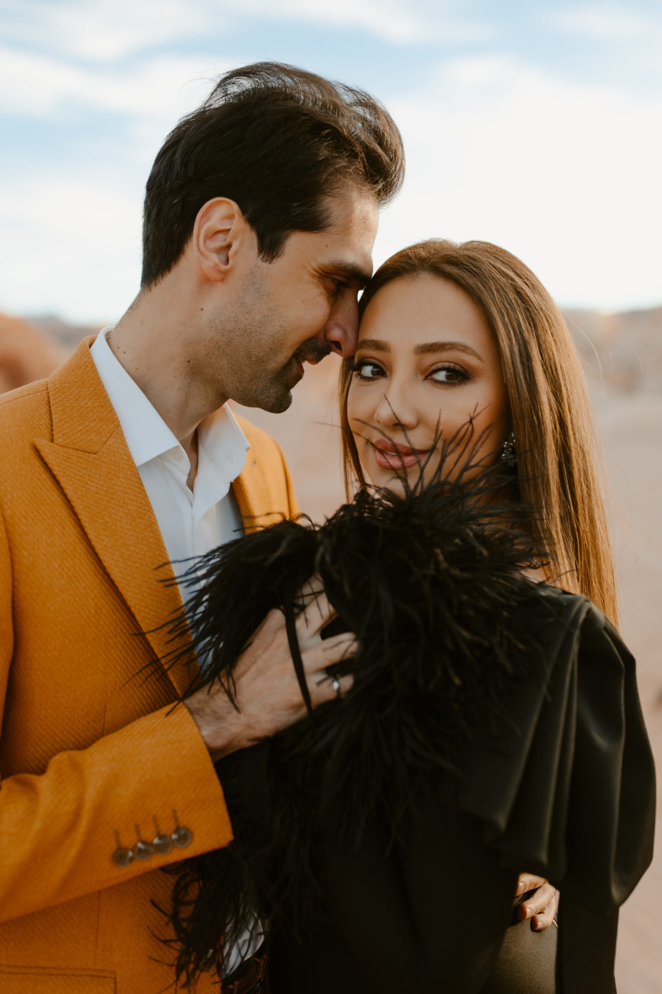 Couple posing for adventurous desert photoshoot in Nevada