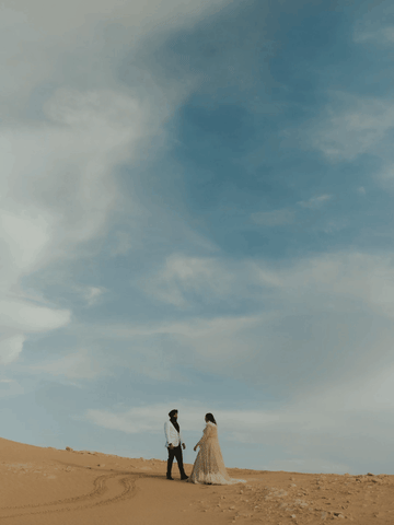 Couple eloping in the nellis sand dunes